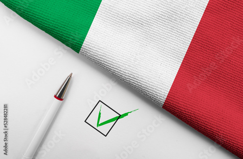 Pencil, Flag of Italy and check mark on paper sheet
 photo