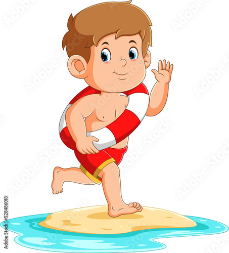 The boy is running while wearing a tire and hand waving