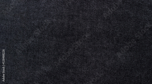 Dark denim texture as background for your image. Modern high quality material for clothes. © Ruzanna