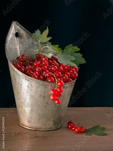 Wallpaper Mural red currant berries in a vase on a wooden table Torontodigital.ca