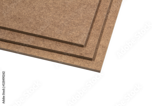 Boards of raw HDF stacked in the form of stairs.