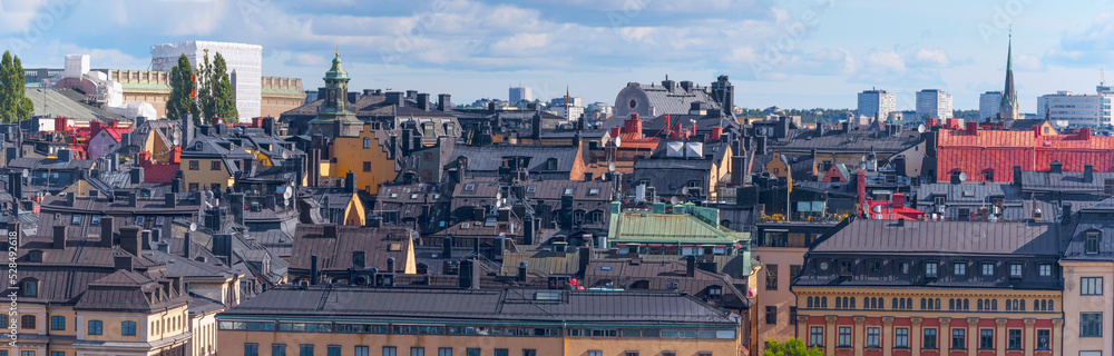 Panorama roof top view of the old town Gamla Stan a sunny autumn day in Stockholm