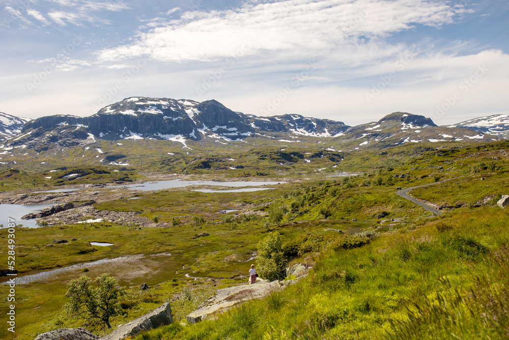 People, children enjoying the amazing views in Norway to fjords, mountains and other beautiful nature