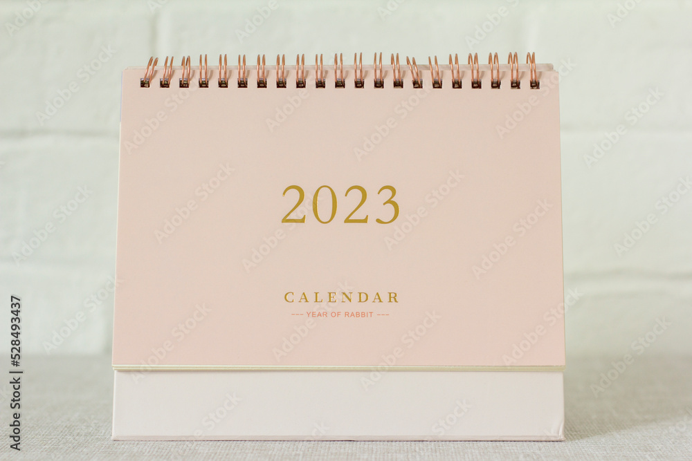 Desktop calendar for the new year 2023 on the table. Desktop calendar for the new year 2023 on the table.