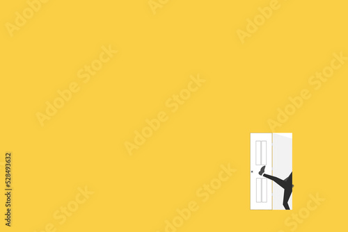 Businessman kicking door to open door on yellow background. Business and management. Way to success. Taking chances.