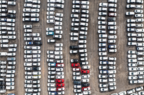 Aerial view directly above rows of new and imported cars