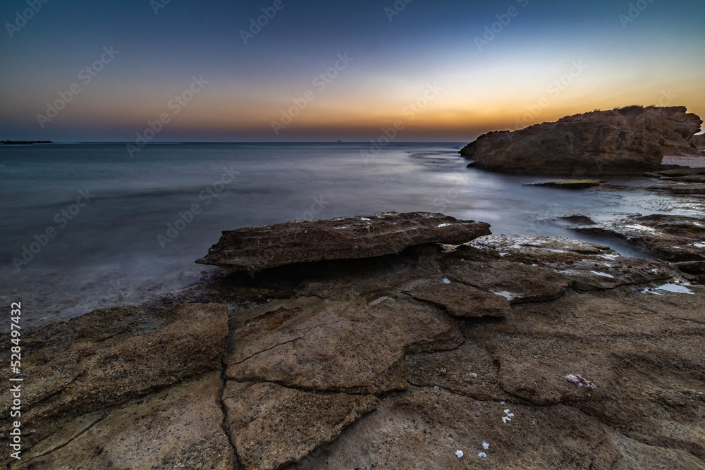 Cracks on flat rocks in the beach sunset nachsholim Israel Cracks on flat rocks in the beach sunset nachsholim Israel