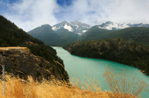 Overview of Diablo Lake in North Cascade National Park of northern Washington state, USA. The Lake is created by Diablo Dam and is located between Ross and Gorge Lake on the Skagit River at 1201 ft. photo