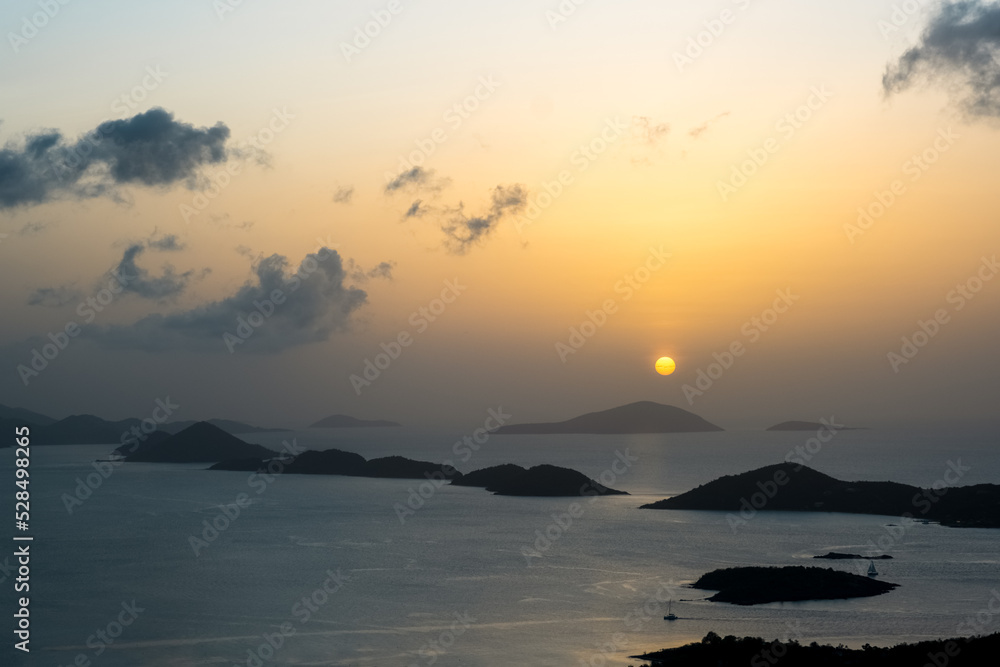 Looking at St. Thomas from St. John during sunset.  Sky is full of sahara desert sand