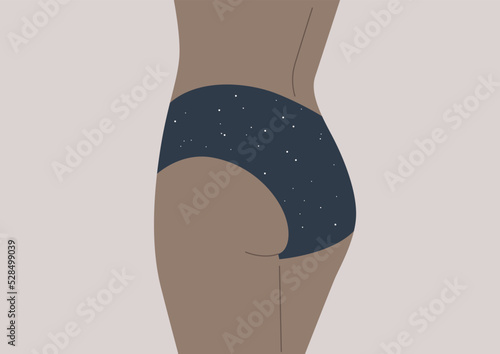 A sporty female body in panties with space pattern, sensual mysteries and secrets