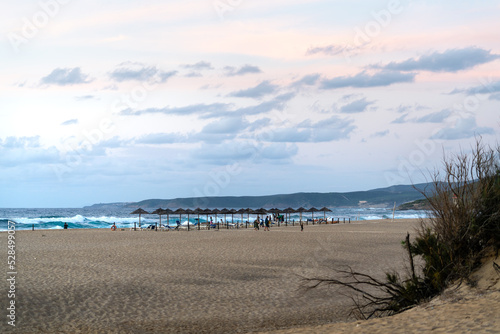 Fototapeta Naklejka Na Ścianę i Meble -  Strandbar an einem Strand auf Sardinien in Italien