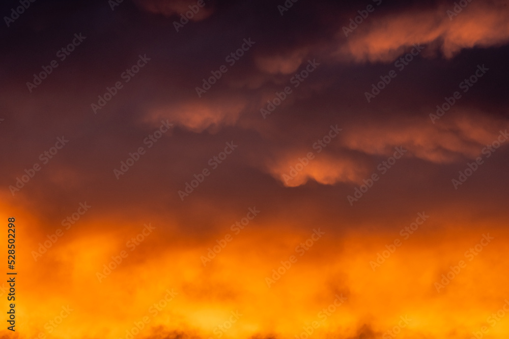 Sunrise Paints A Gradient Of Purple To Orange Over The Clouds