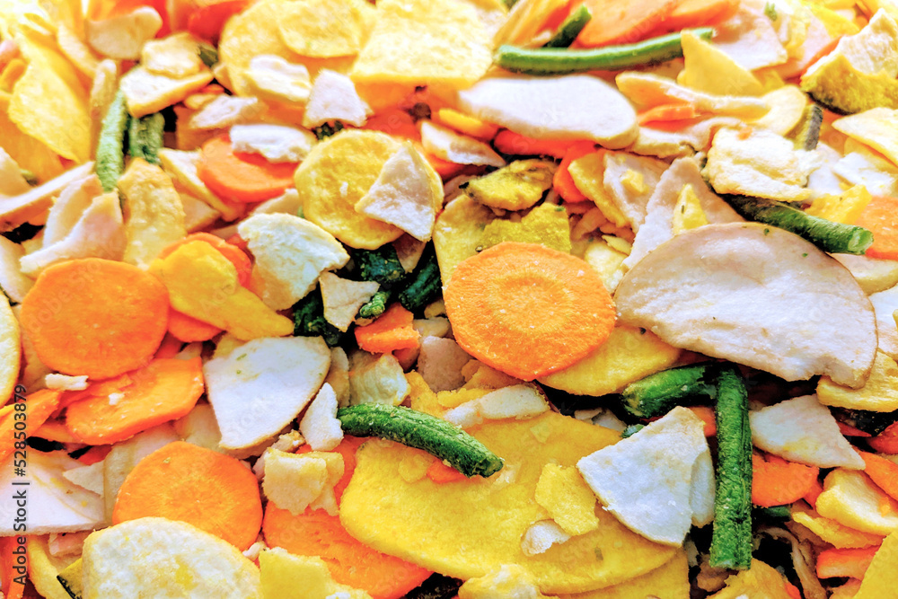Mixture of dried vegetables. Healthy vegetable chips. Vegan, vegetrian food, healthy snack. Top view