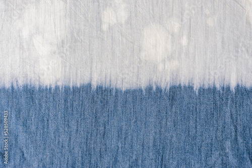 tie dye pattern hand dyed on cotton fabric abstract texture background.