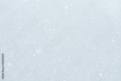 Abstract winter background with falling snow