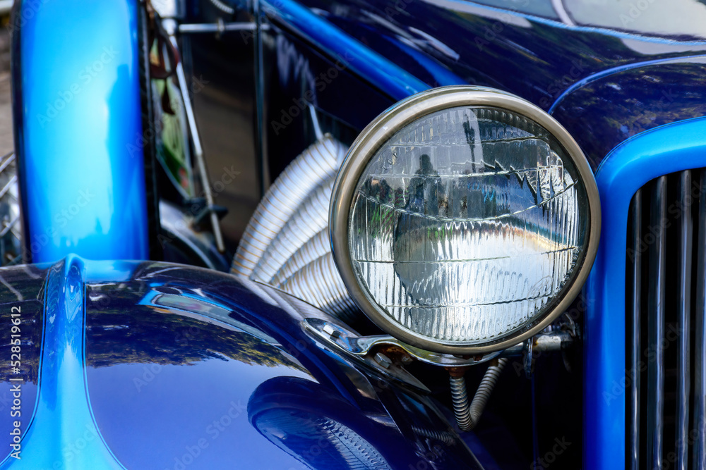 Detail of antique blue car in perfect condition