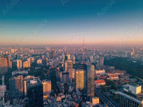 Aerial panoramic cityscape view of Ho Chi Minh city and Saigon river  Vietnam. Center of heart business at downtown with buildings and towers.