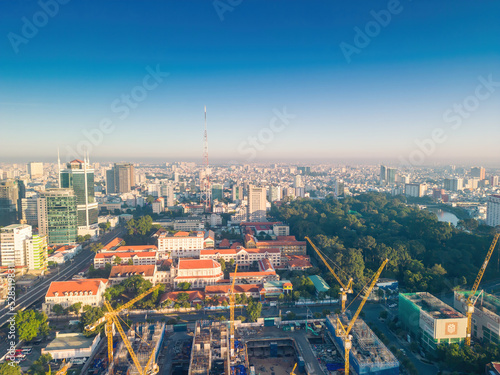 Aerial panoramic cityscape view of Ho Chi Minh city and Saigon river  Vietnam. Center of heart business at downtown with buildings and towers.