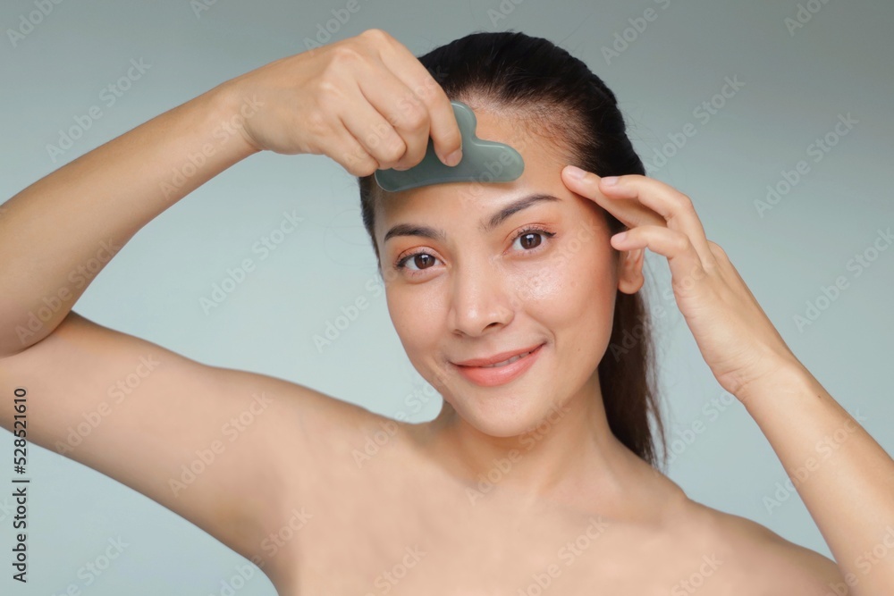 Beautiful Asian woman with natural makeup, facial treatment spa and beauty, Smiling beautiful woman standing over isolated background with copy space. Beautiful Asian woman with natural makeup, facial treatment spa and beauty, Smiling beautiful woman standing over isolated background with copy space.