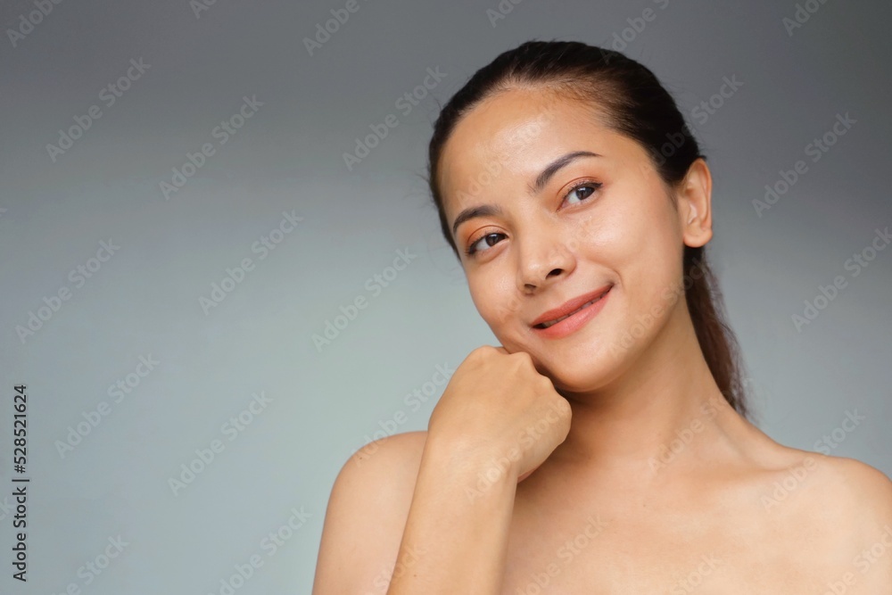 Beautiful Asian woman with natural makeup, facial treatment spa and beauty, Smiling beautiful woman standing over isolated background with copy space. Beautiful Asian woman with natural makeup, facial treatment spa and beauty, Smiling beautiful woman standing over isolated background with copy space.
