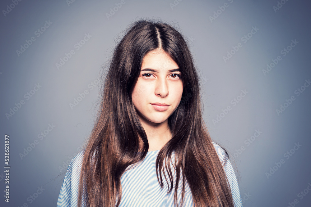 Girl with thick eyebrows posing in the studio Girl with thick eyebrows posing in the studio