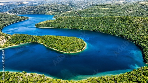 Aerial of Jennings Randolph lake surrounded by woods, West Virginia and Maryland. photo