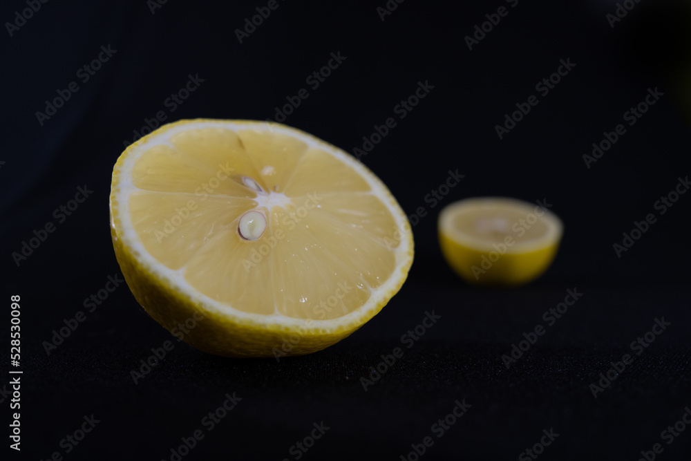 lemon slices on a dark background