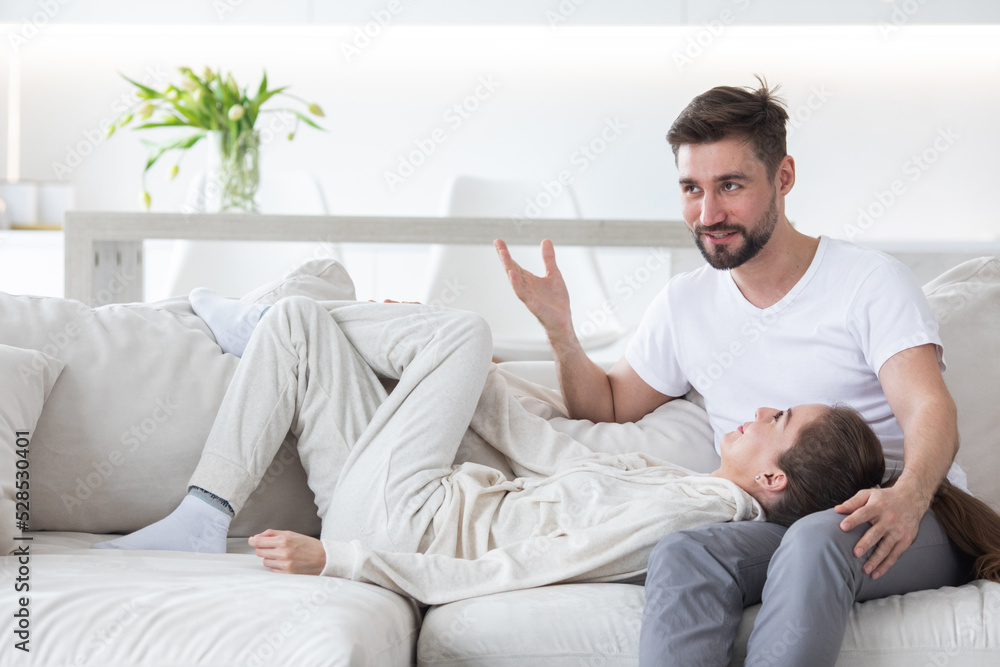 Romantic couple relaxing at home Romantic couple relaxing at home