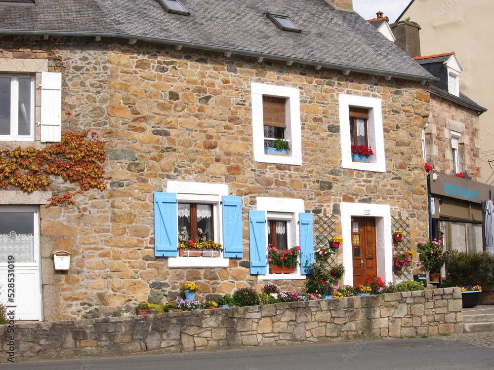 House with blue shutters in Brittany