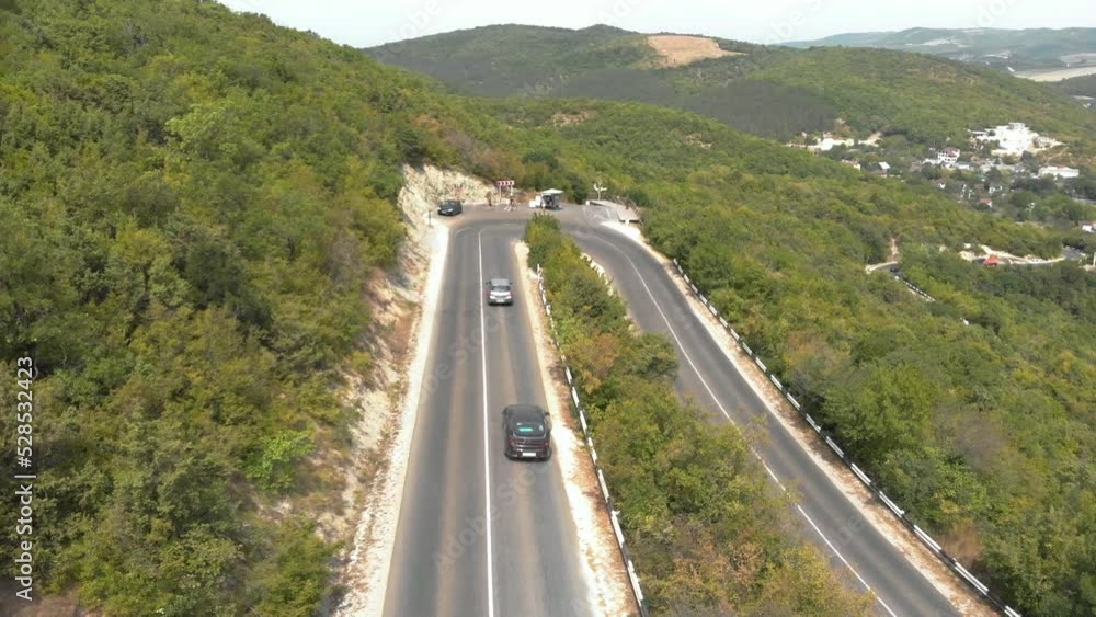 Automobile road in the mountains. Cool turn. Green trees. Car movement. Resort place. Parking
on my way. Viewpoint. Village. Shooting from a drone. Camera span. Automobile road in the mountains. Cool turn. Green trees. Car movement. Resort place. Parking
on my way. Viewpoint. Village. Shooting from a drone. Camera span.
