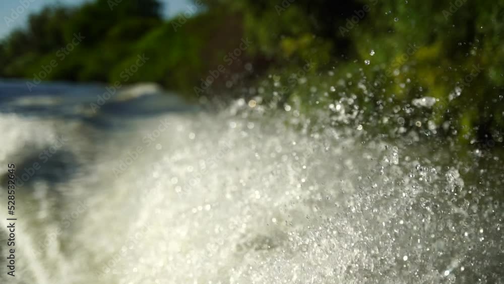 Slow motion video of water splashing from a boat. Slow motion video of water splashing from a boat.