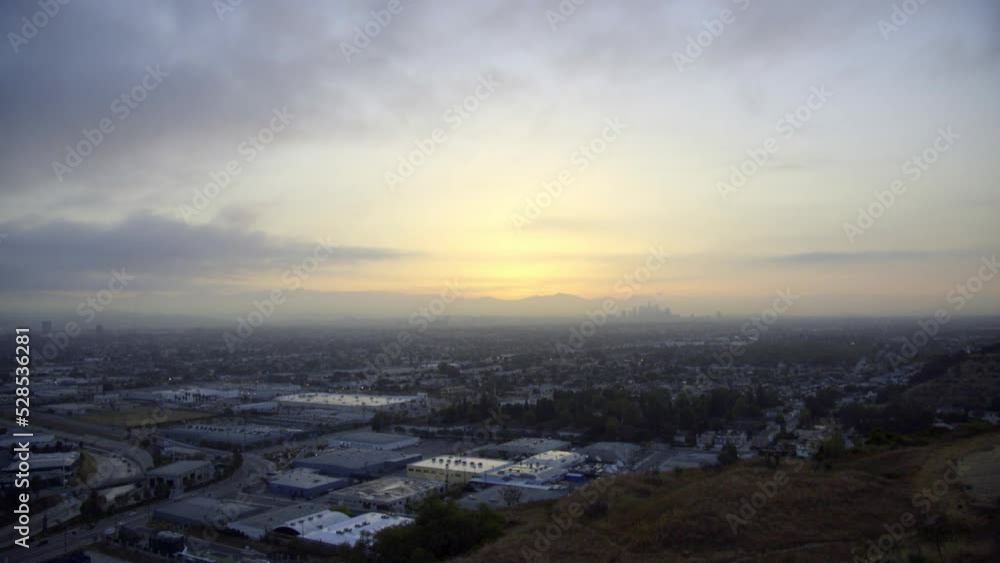 Aerial Lockdown Shot Of Residential City Under Cloudy Sky During Sunset - Los Angeles, California Aerial Lockdown Shot Of Residential City Under Cloudy Sky During Sunset - Los Angeles, California