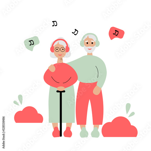 Elderly couple listening to music on their smartphone in the park. Old people using modern technology..