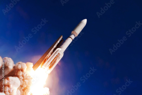 Launch of a space rocket into space. Elements of this image furnished by NASA