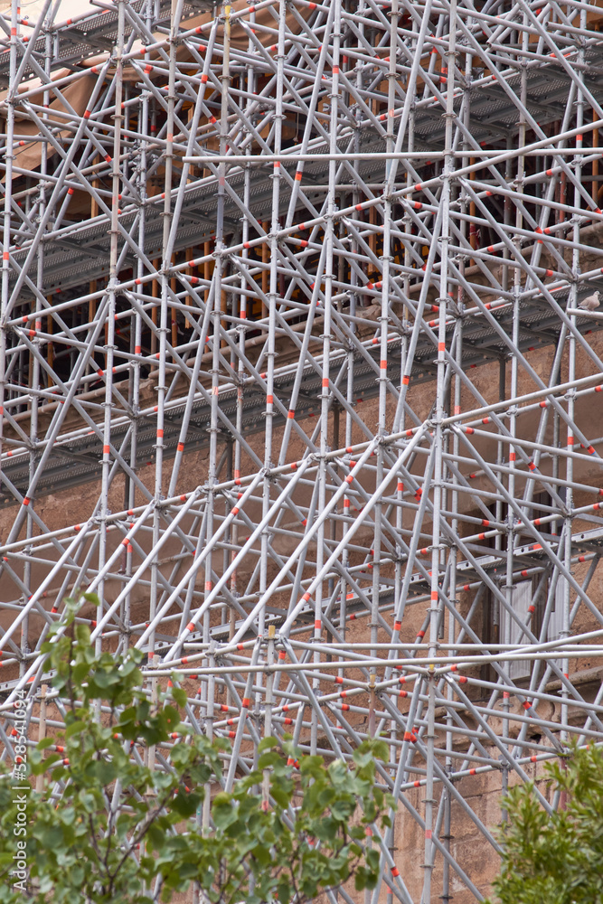 Building repair with metal scaffolding