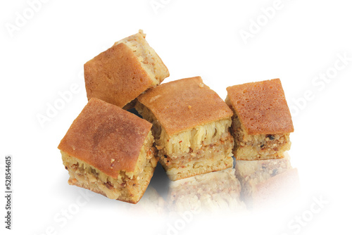 sweet martabak with peanut topping isolated on white background. Martabak is a very popular snack in Indonesia because it has a sweet, chewy and soft taste. photo