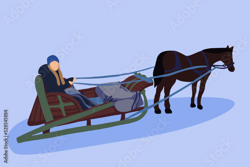 A girl on a sled in a harness.
