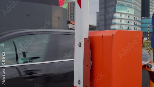 Wallpaper Mural Barrier is raised and car enters parking lot. Security system for access to building - with paid cabin, and video surveillance system. Barrier on car parking. Automatic security of territory of buildi Torontodigital.ca