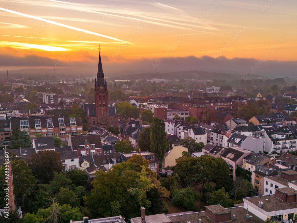 Fototapeta premium Aerial view of church in sunset