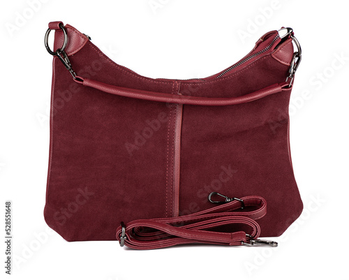 Fashionable suede women's handbag with a strap on a white background.