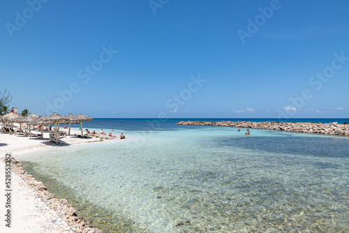 Fototapeta Naklejka Na Ścianę i Meble -  View of a resort on the tropical beach in Runaway Bay  (Jamaica).