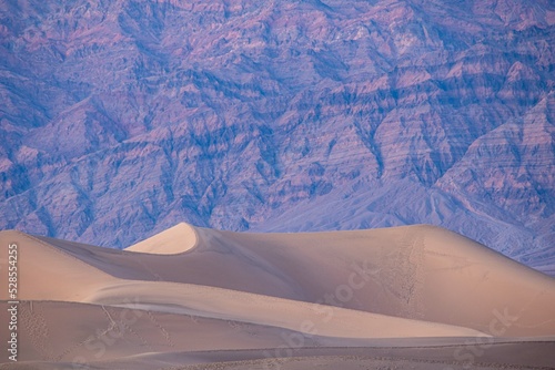 the sand dunes of death valley national park in the sunset