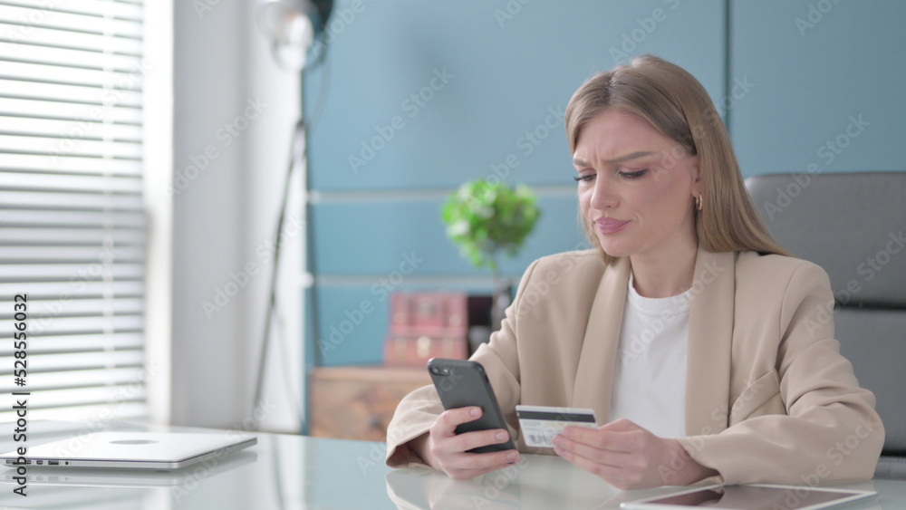 Businesswoman Having Online Payment Problems vial Smartphone at Work Businesswoman Having Online Payment Problems vial Smartphone at Work