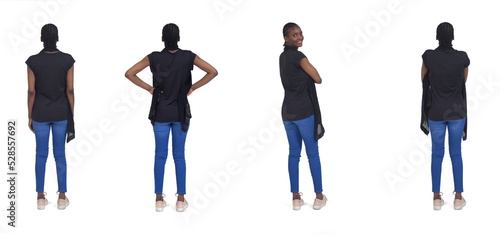 Fotografie back view of same woman, turned and looking at camera, on white background