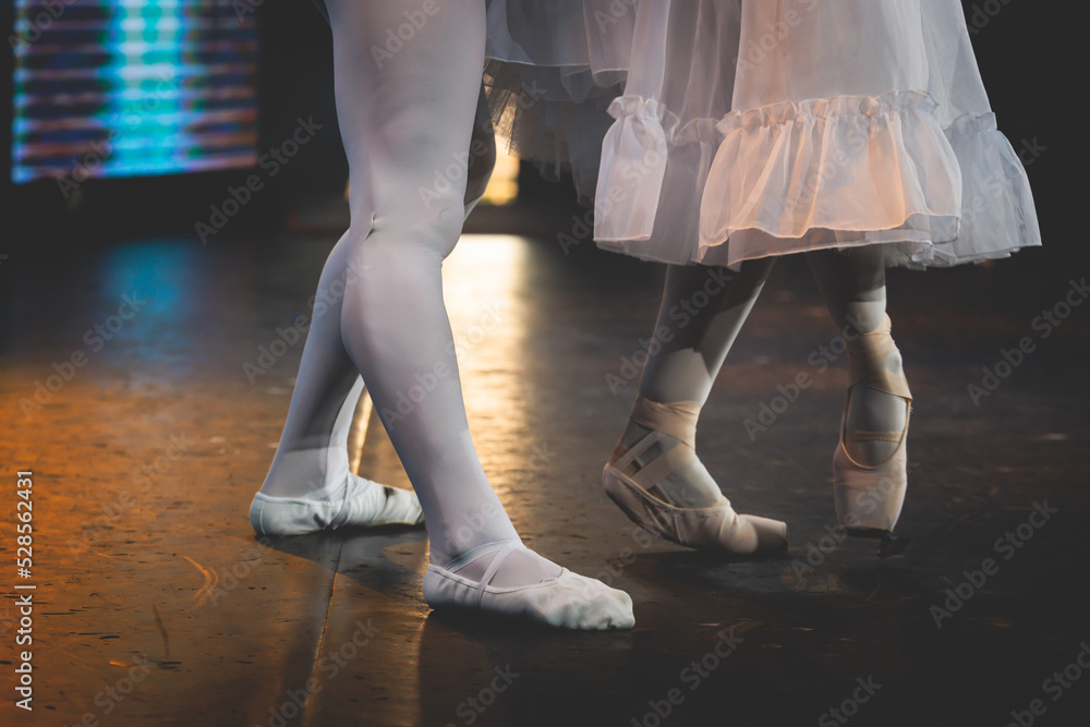 Ballet dancers couple during performance repetition, classic ballet