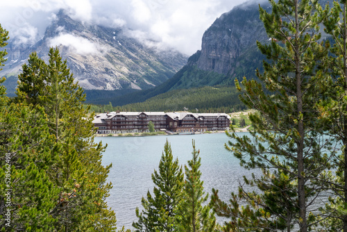 Fototapeta Naklejka Na Ścianę i Meble -  \Historic Many Glacier Hotel in Glacier National Park on an overcast rainy day
