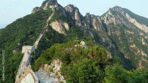 Tilt up shot showing the remote Jiankou section of the Great Wall of China during summer in the Huairou District north of Beijing, China.  photo