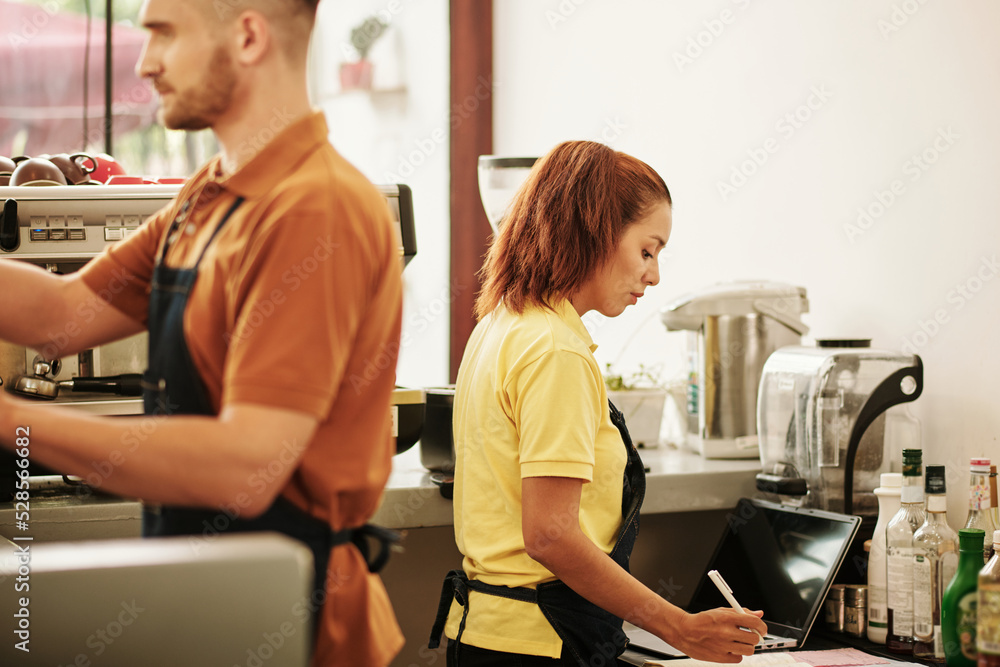 Young People Working in Coffeeshop Young People Working in Coffeeshop