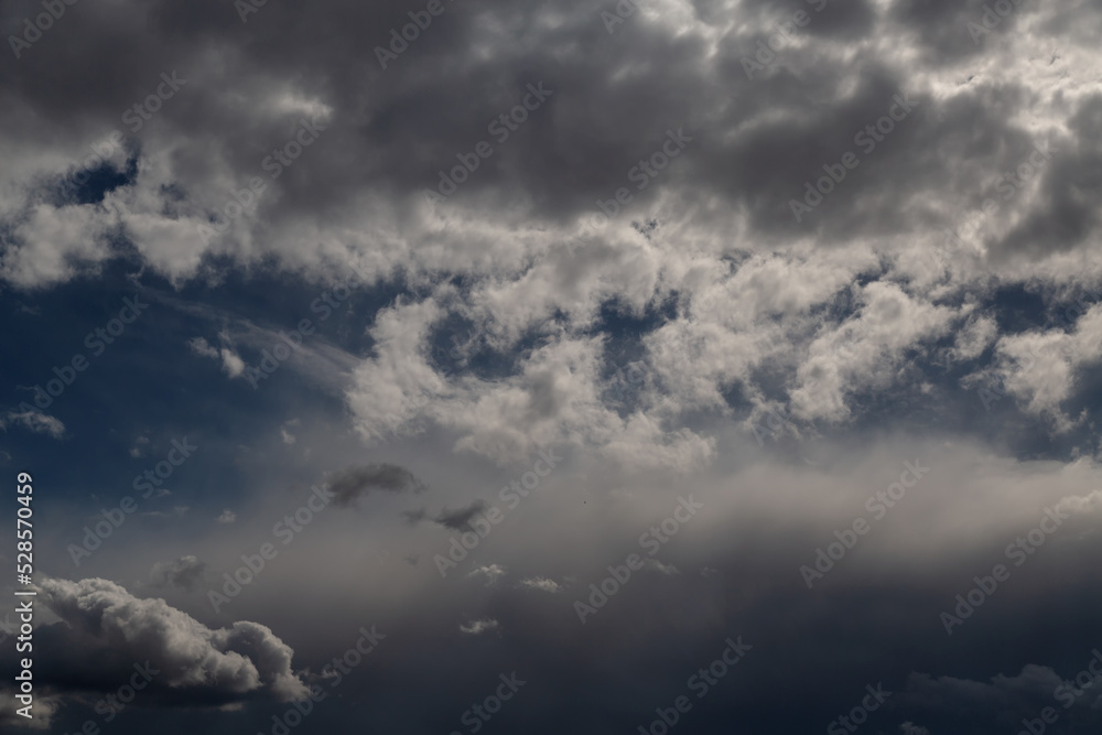 Beautiful cloudy sky before a thunderstorm play of shadow and light Beautiful cloudy sky before a thunderstorm play of shadow and light