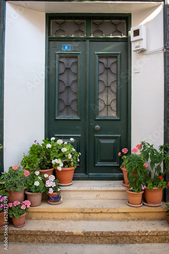 Bozcaada's Greek Quarter is very striking with its well-kept houses, beautiful doors, and thousands of flowers.  © alikart